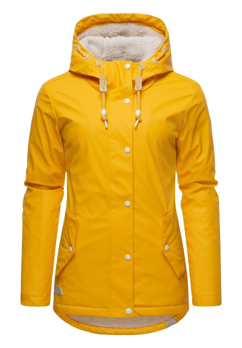 Geltonas vandeniui atsparus švarkas su minkštu vilnos pamušalu, su gobtuvu, spaustukais, virvutėmis ir šoninėmis kišenėmis. Pasižymi lygiu, blizgiu paviršiumi.