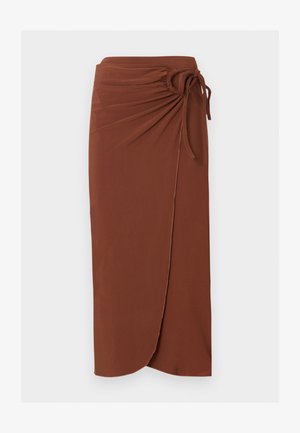 Brown midi wrap skirt with gathered ruched detail and tied bow on the right side, featuring a curved hemline.