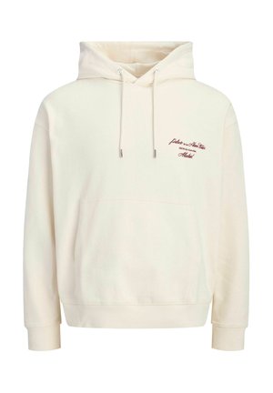 Sweat à capuche couleur crème avec poche kangourou et petite broderie de texte bordeaux sur le côté gauche de la poitrine.