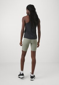 Nike Performance ZENVY - Leggings - light army/black