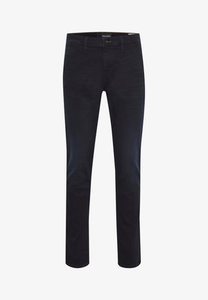 Mørkeblå denim jeans med slim fit, fem-lomme design og lynlås. Materialet har en glat tekstur med minimal falming.