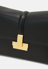 ALDO AVERIL - Geantă de mână - black