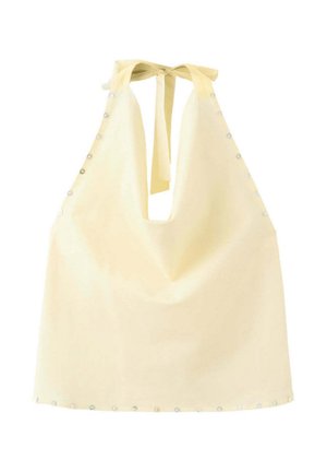 Haut dos nu jaune clair avec un profond décolleté en V, noué au cou, et petits clous décoratifs le long des côtés et de l'ourlet inférieur.