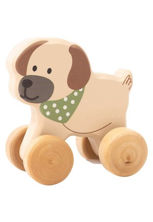 Wooden dog toy with a light beige body, brown ears and nose, green polka-dot scarf, and cylindrical wooden wheels. Smooth texture.