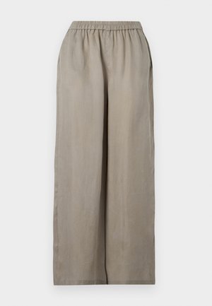 Pantaloni marrone chiaro a gamba larga con vita elastica e tasche laterali, mostrati su uno sfondo uniforme.