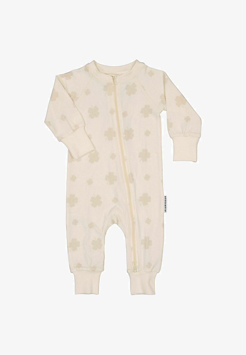 Cremefarvet bomuldsbody med lynlås foran, der har subtile blomsterprints og manchetter ved ærmer og ben for en tætsiddende pasform.