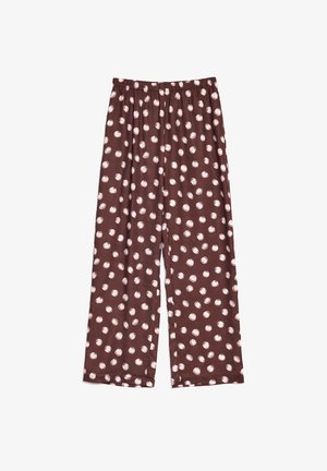Pruunid pidžaamapüksid, mis on valmistatud pehmest kangast, pakuvad mugavat lõdvestunud istuvust ja neil on elastne vöökoht. Muster koosneb ebaühtlastest valgetest täpikestest.