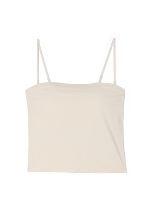 Crèmekleurige mouwloze cropped top met dunne verstelbare spaghettibandjes en een rechte halslijn op een witte achtergrond.