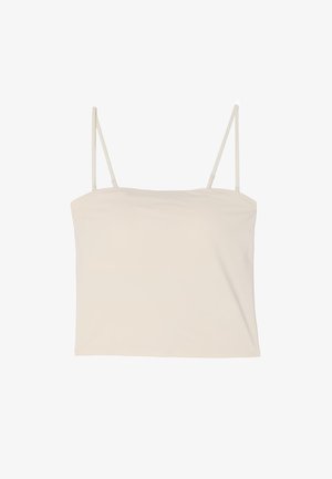 Crèmekleurige mouwloze cropped top met dunne verstelbare spaghettibandjes en een rechte halslijn op een witte achtergrond.