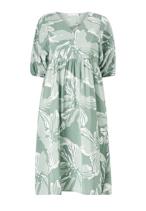 Grøn blomsterkjole med V-udskæring og pufærmer. Fremstillet af letvægtsstof med hvide botaniske tryk og en flydende silhuet.
