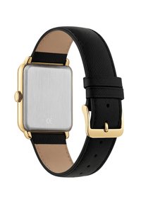 Rechteckige silberne Metalluhr mit einer goldenen Lünette. Schwarzes strukturiertes Lederarmband mit goldenen Beschlägen und einer hellbraunen Unterseite.