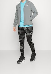 Nike Performance Jogginghose - black