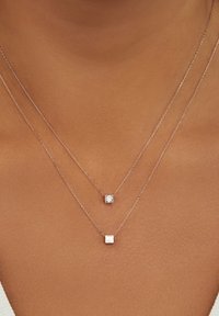 Isabel Bernard Bedel - rose gold-coloured
