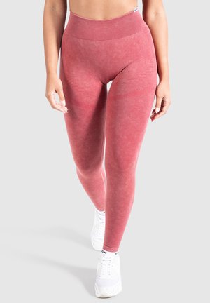 Hochtaillierte, körperbetonte Leggings aus strukturiertem rosé-pinkem Stoff mit geripptem Bund und Akzentdetails an den Oberschenkeln.