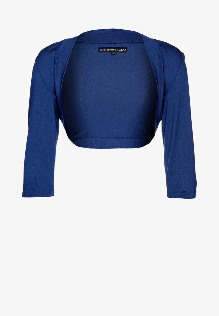 Cardigan bleu court avec des manches longues, fabriqué dans un tissu doux. Il présente un col rond et une étiquette de logo à l'intérieur à l'arrière.