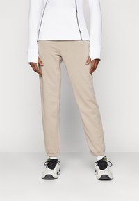 Under Armour - RIVAL TERRY JOGGER  - Pantaloni de trening - solid timberwolf taupe/white Imagine miniatură 1