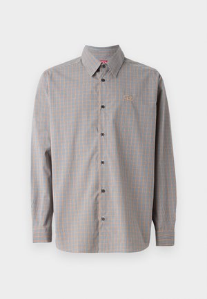 Krekls ar pogām, zilā un oranžā pārbaudītā rakstā, ar garām piedurknēm, norādītu apvalku un nelielu logo krūšu kabatas rajonā.