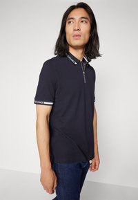 Armani Exchange Piké - deep navy