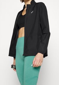 ASICS Leggings - turquoise