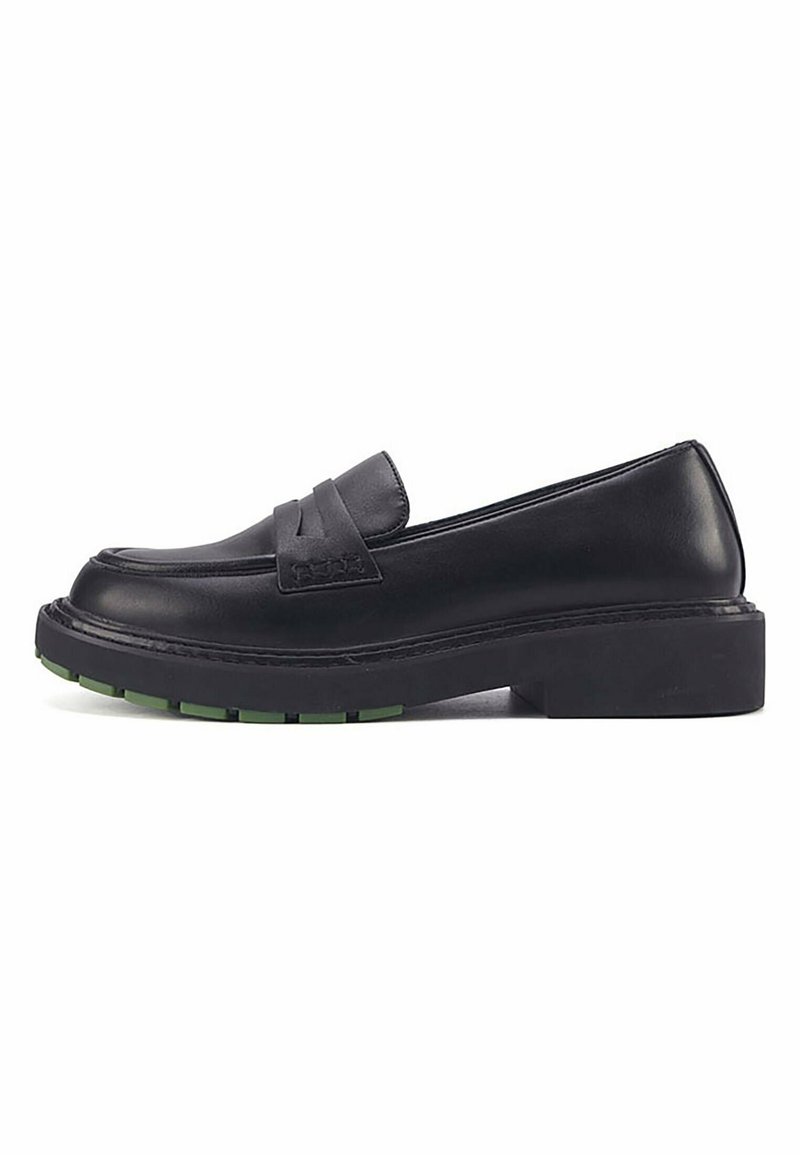 Black leather loafers featuring a stitched, raised strap, chunky sole, and green accent on the tread. Classic, rounded toe shape.