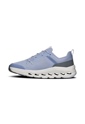 Light blue athletic shoe with mesh fabric, lace-up design, cushioned white sole with black accents, and pull tab at the heel.