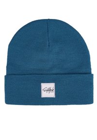 Knitted beanie hat in teal blue with a ribbed texture. Features a folded cuff and a square logo patch on the front.