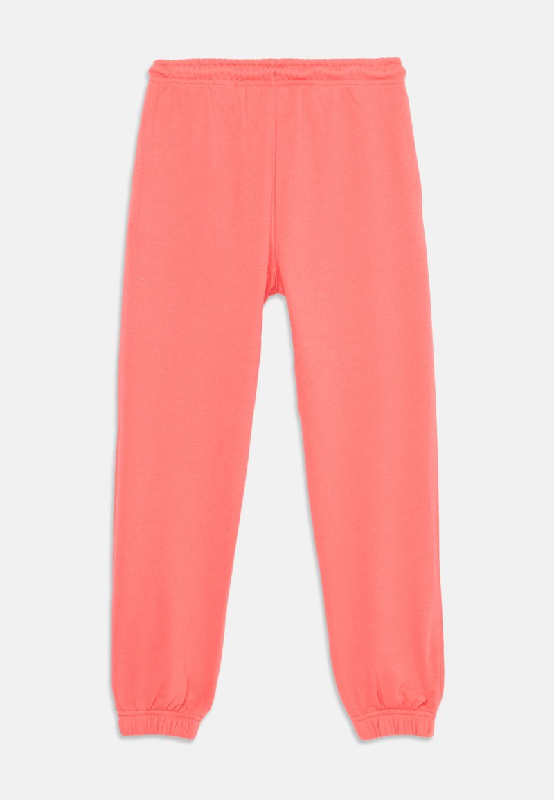 Pantalons de sport roses avec une taille élastique et des poignets froncés. Fabriqués en tissu doux et extensible, présentant une texture lisse et sans motifs.