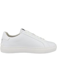 White leather sneakers with a smooth texture, round toe, and subtle stitching, featuring white laces and a low-profile rubber sole.