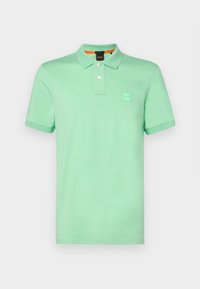 - Koszulka polo