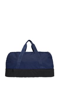 Duflová taška s telom z námornícky modrej tkaniny a čiernym dnom, s dvomi hornými rúčkami, zipsom po celej dĺžke a hladkým povrchom.