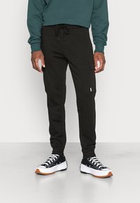 Jack & Jones JPSTGORDON JJSHARK   - Pantalones deportivos - black