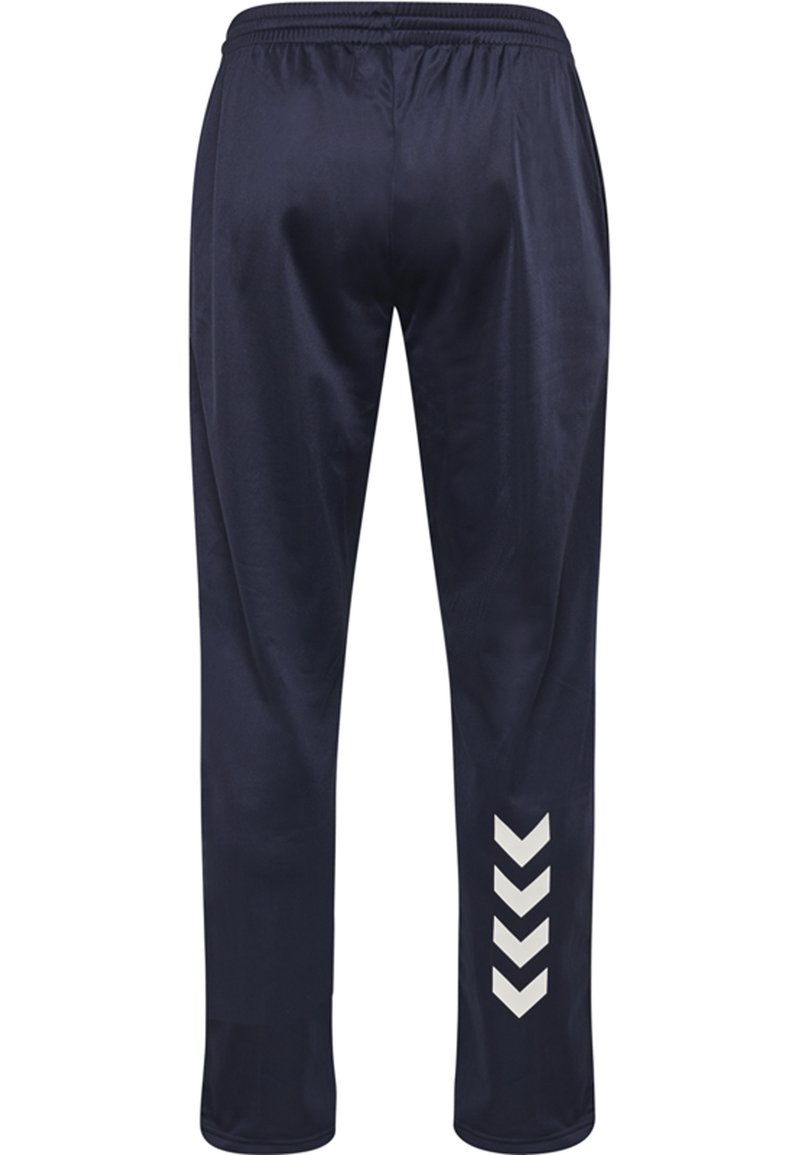 Pantalons de survêtement navy en tissu lisse, avec un graphique en chevron blanc le long de la jambe inférieure et une taille élastique pour le confort.