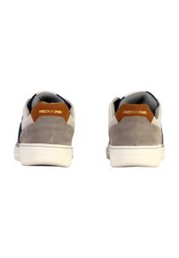 Sneakers with a grey suede heel, navy accent, and white rubber sole. Features tan leather detail with "REDSKINS" logo in gold on the heel.