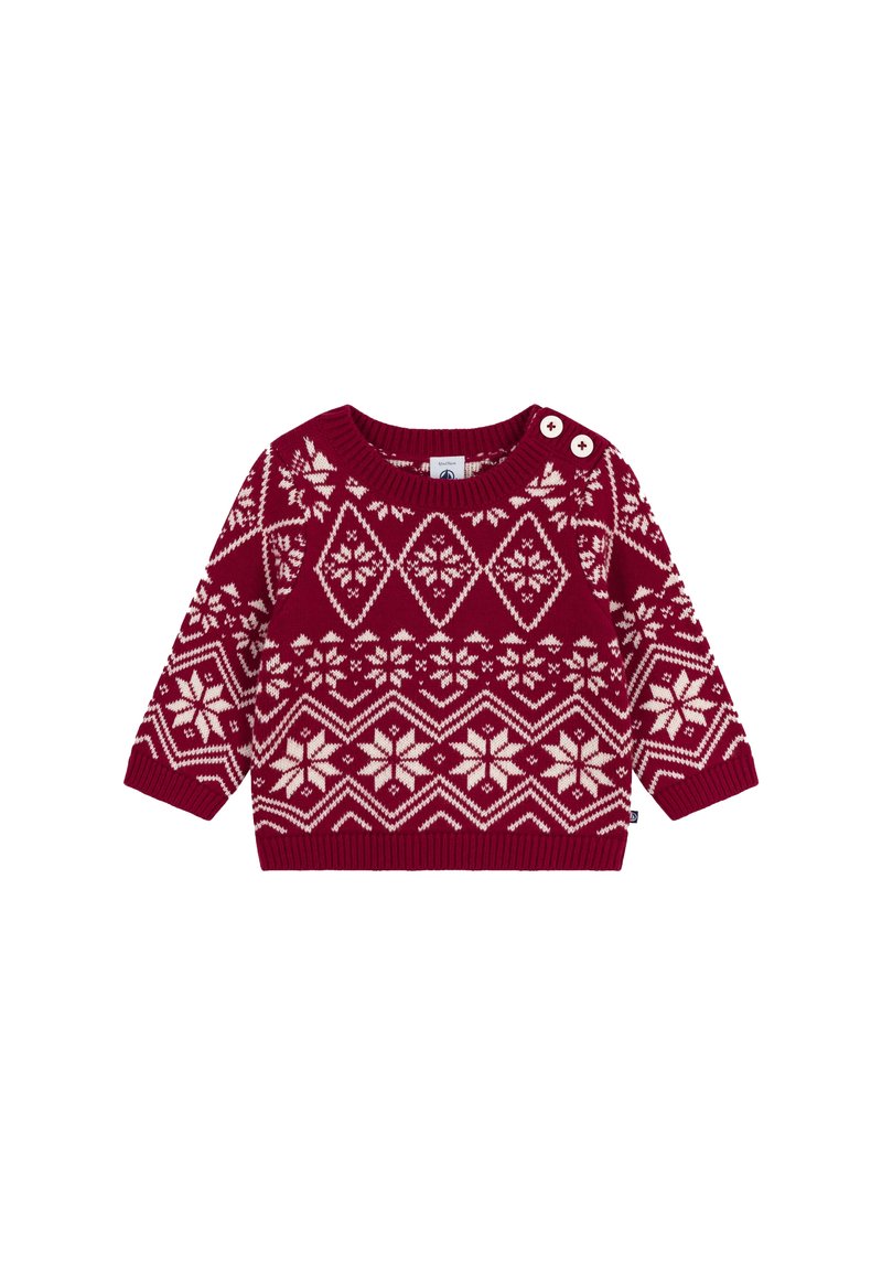 Maglione rosso lavorato a maglia con motivi geometrici color crema, fiocchi di neve e due bottoni sulla spalla per facilitare la vestizione.