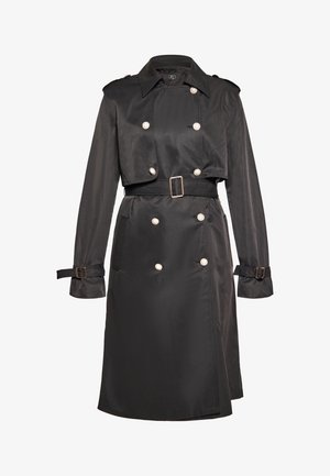 Abrigo negro estilo trench con diseño de doble botonadura, grandes botones, cuello estructurado y cinturón removible. Fabricado en una tela suave y texturizada.