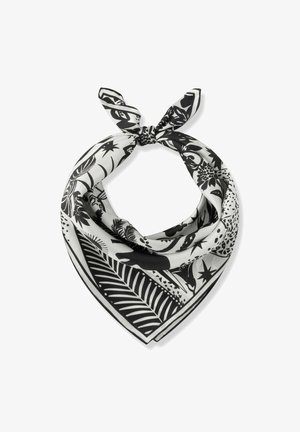 Écharpe en soie à motifs noirs et blancs avec des feuilles tropicales et des formes géométriques, nouée en un nœud lâche.