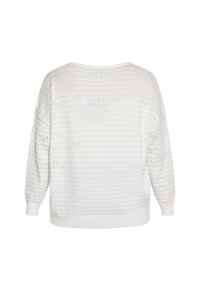 Maglione bianco in tessuto a trama con strisce orizzontali e motivi a pois. Vestibilità ampia, spalle scese e polsini e orlo a costine.