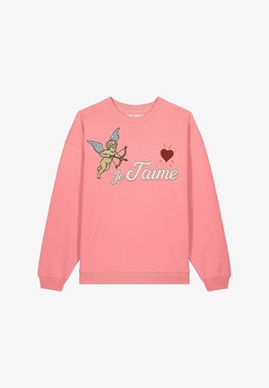 Roze sweatshirt met een geborduurde cupido met vleugels, een hart en de tekst "Je T'aime." Geribbelde boorden en zoom, losse pasvorm.