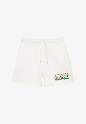 Short blanc à taille élastique avec cordon de serrage et un logo "One Piece Paradise Awaits" représentant des palmiers et un crâne sur la jambe gauche.
