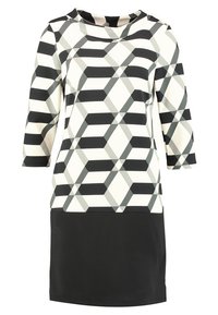 Svartvitt geometriskt mönstrat klänning med trekvartslånga ärmar, en rund halslinning och en helsvart nederdel. Slät tygkvalitet.