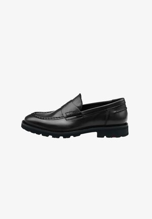 Sorte læder loafers med en glat overflade, dekorativ syning og en flad gummisål. Skoen har et klassisk mokkasindesign.