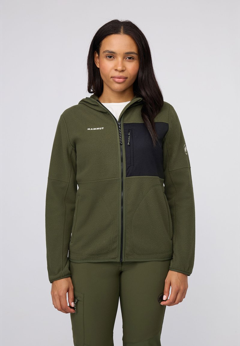 Green fleece jacket with a black chest panel, zip closure, and hood; features logo accent and zippered pocket on the left side.