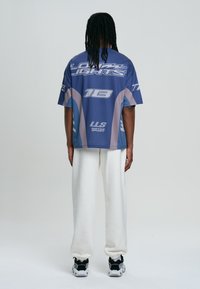 LOW LIGHTS STUDIOS® Triko s potiskem - dark blue