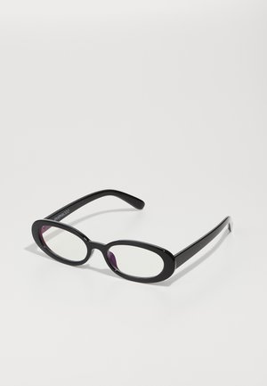Lunettes ovales noires avec des verres transparents, présentant une finition lisse et des branches larges. Les verres ont une teinte violette subtile. Logo sur le côté.