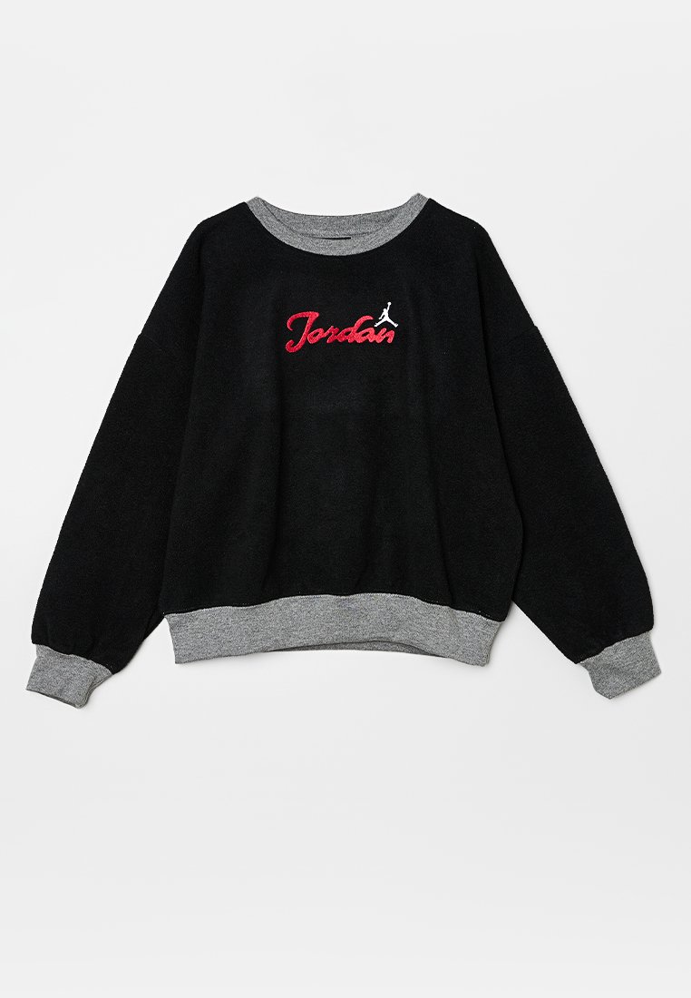 Sweatshirt en polaire noir avec des poignets et un col gris. Présente un logo "Jordan" brodé en rouge avec une silhouette blanche au-dessus du texte.
