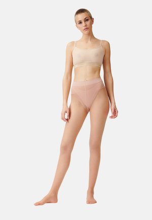 Set di lingerie color nude chiaro composto da un bralette senza cuciture con spalline regolabili e culotte alte in pizzo trasparente con pannelli geometrici.