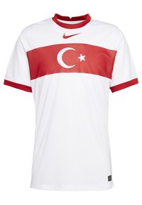 White shirt with red short sleeves and collar. Features a horizontal red band with a white crescent and star in the center. Nike logo present.