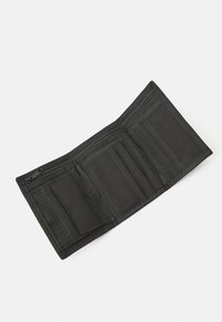 Black wallet made of fabric with a zippered compartment. Features multiple card slots and a textured surface. Open flat design.
