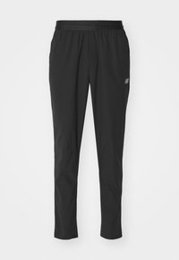 AC STRETCH REGULAR - Tracksuit bottoms - black