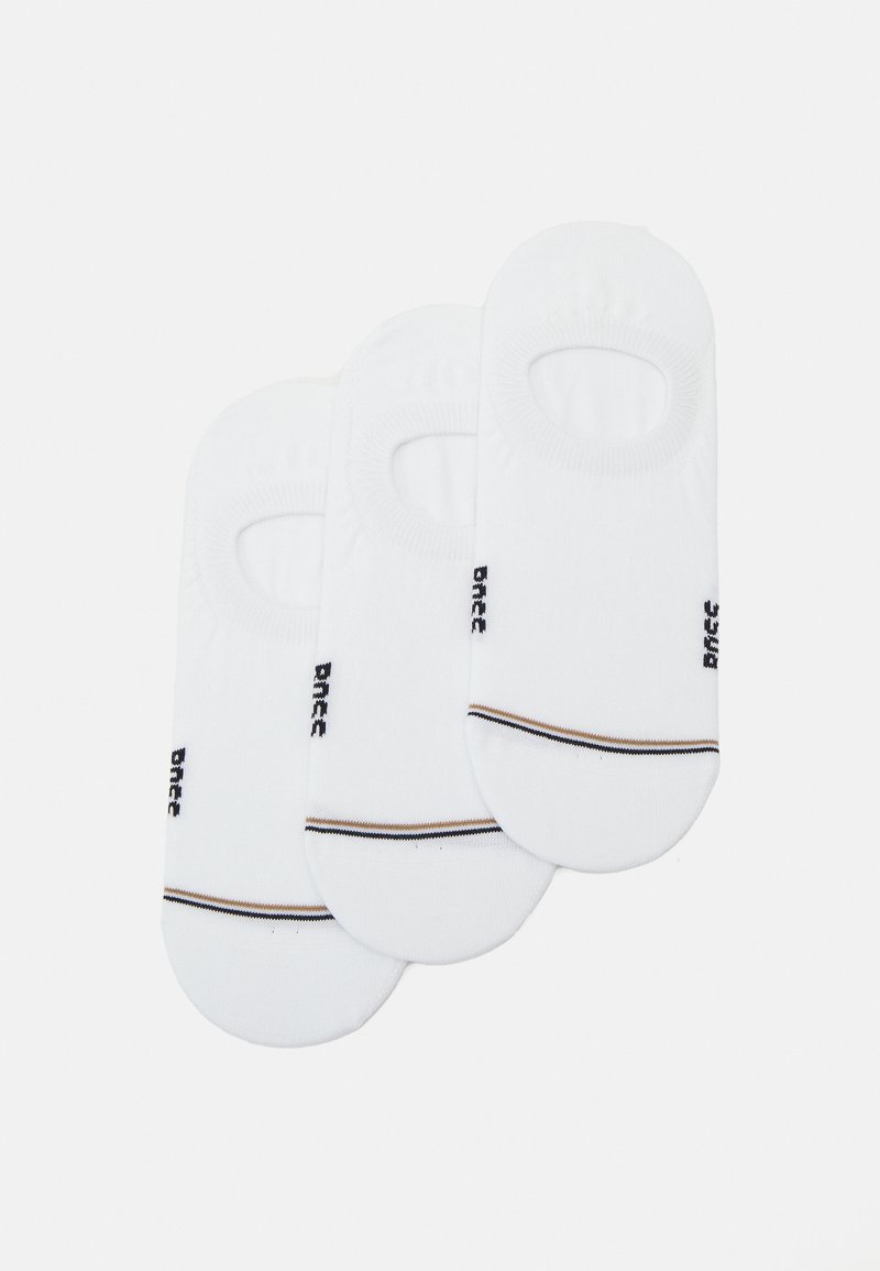 Calzini bianchi invisibili realizzati in misto cotone con aperture elastiche, dotati di logo nero e una sottile striscia marrone e nera sul tallone.